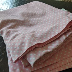 Pottery Barn Kids pink polka dot blackout curtains